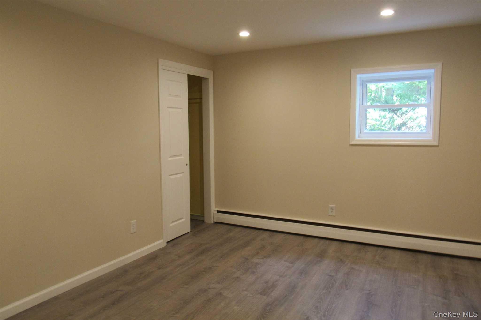 1425 Highway 82, Unit B Hopewell Junction, NY 12533 - Photo 14 of 19 an empty room with a empty space and window