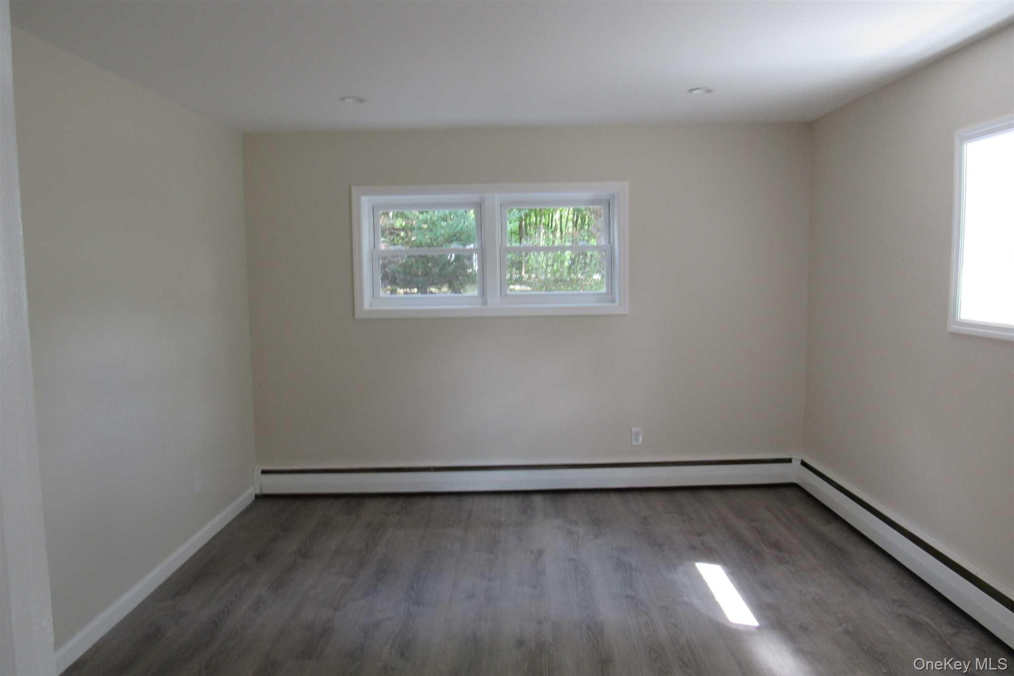 1425 Highway 82, Unit B Hopewell Junction, NY 12533 - Photo 10 of 19 an empty room with a window