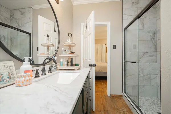 a bathroom with a toilet a sink and a mirror