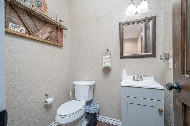 a view of walk in closet with clothes