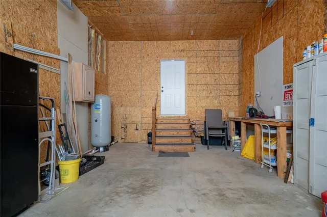 a room with toys and a book shelf