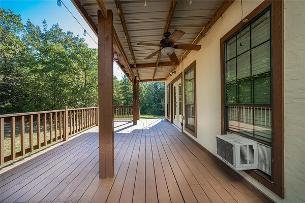 a backyard of a house with lots of tree