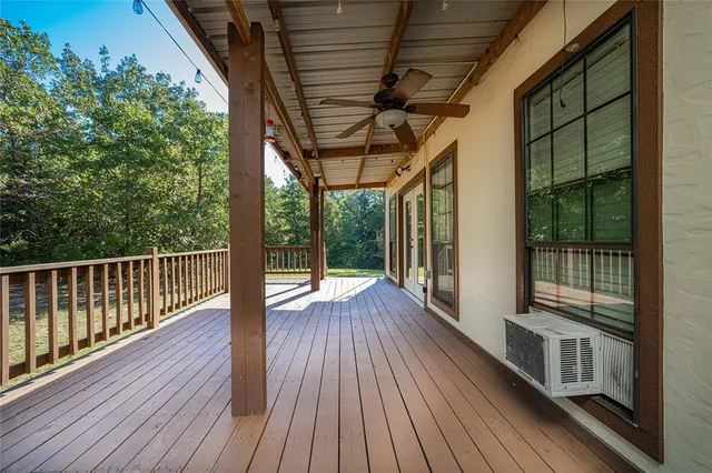 a backyard of a house with lots of tree