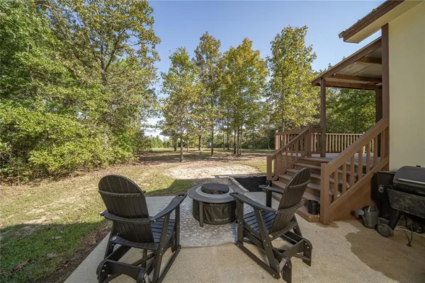 a view of a porch with furniture