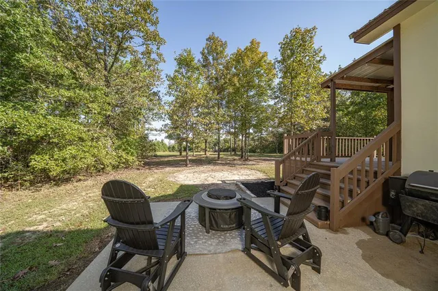 a view of a porch with furniture
