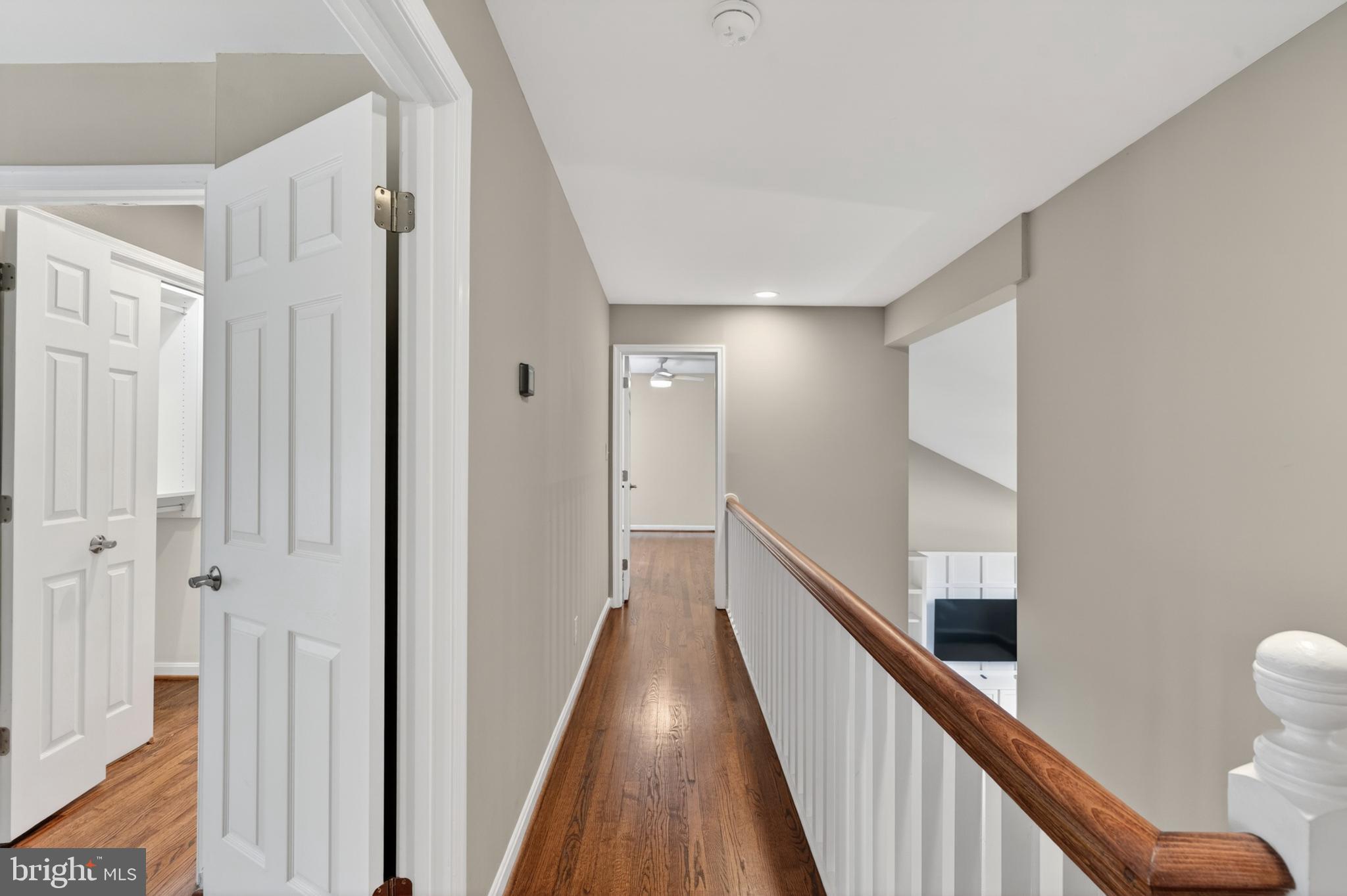 6 Nearfield Road Lutherville-Timonium, MD 21093 - Photo 50 of 71 a view of a hallway with wooden floor and staircase
