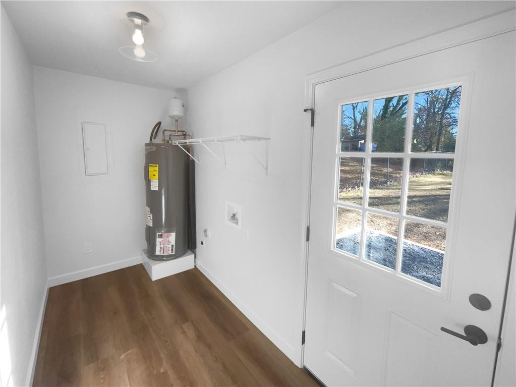 314 Jackson Street Cartersville, GA 30120 - Photo 12 of 18 a view of empty room with wooden floor and fan