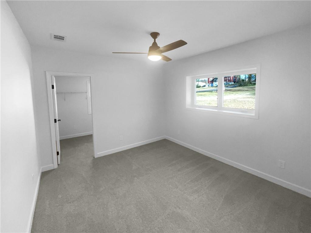314 Jackson Street Cartersville, GA 30120 - Photo 13 of 18 a view of an empty room with a window