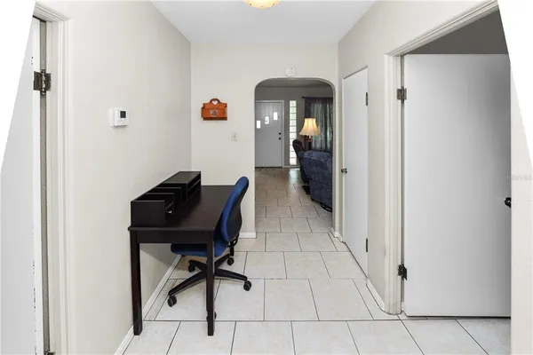 wooden floor in a hall with an entryway