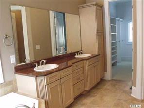3200 Lake Shore Road South Denver, NC 28037 - Photo 10 of 16 a bathroom with double sink and a mirror