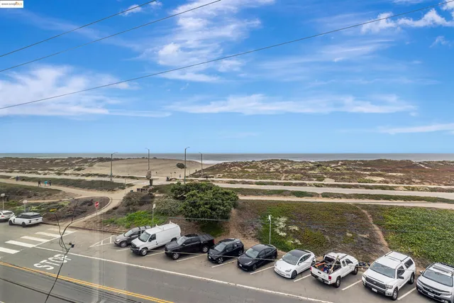 a view of a ocean with beach