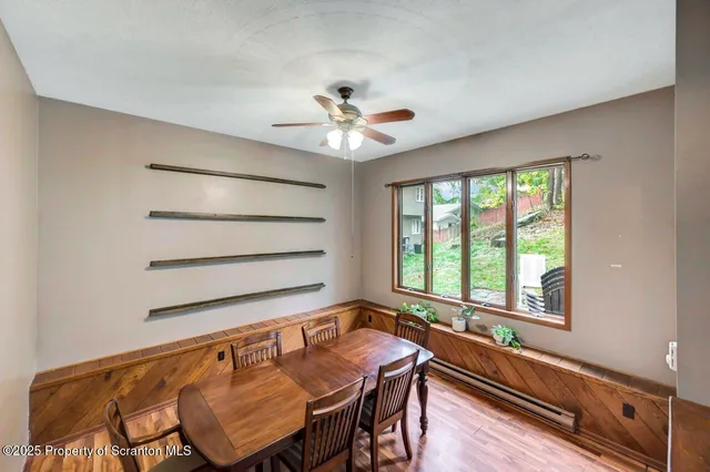 a kitchen with a stove a sink and a microwave