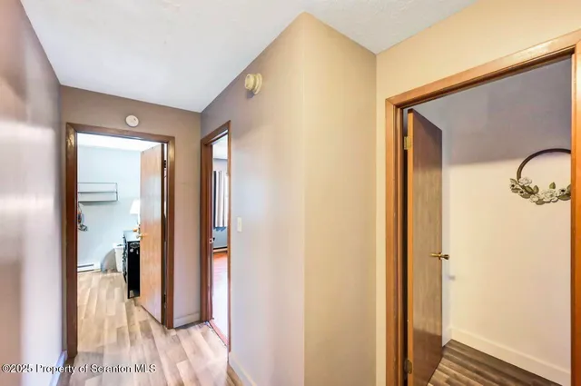 a view of a chairs and table in the back yard