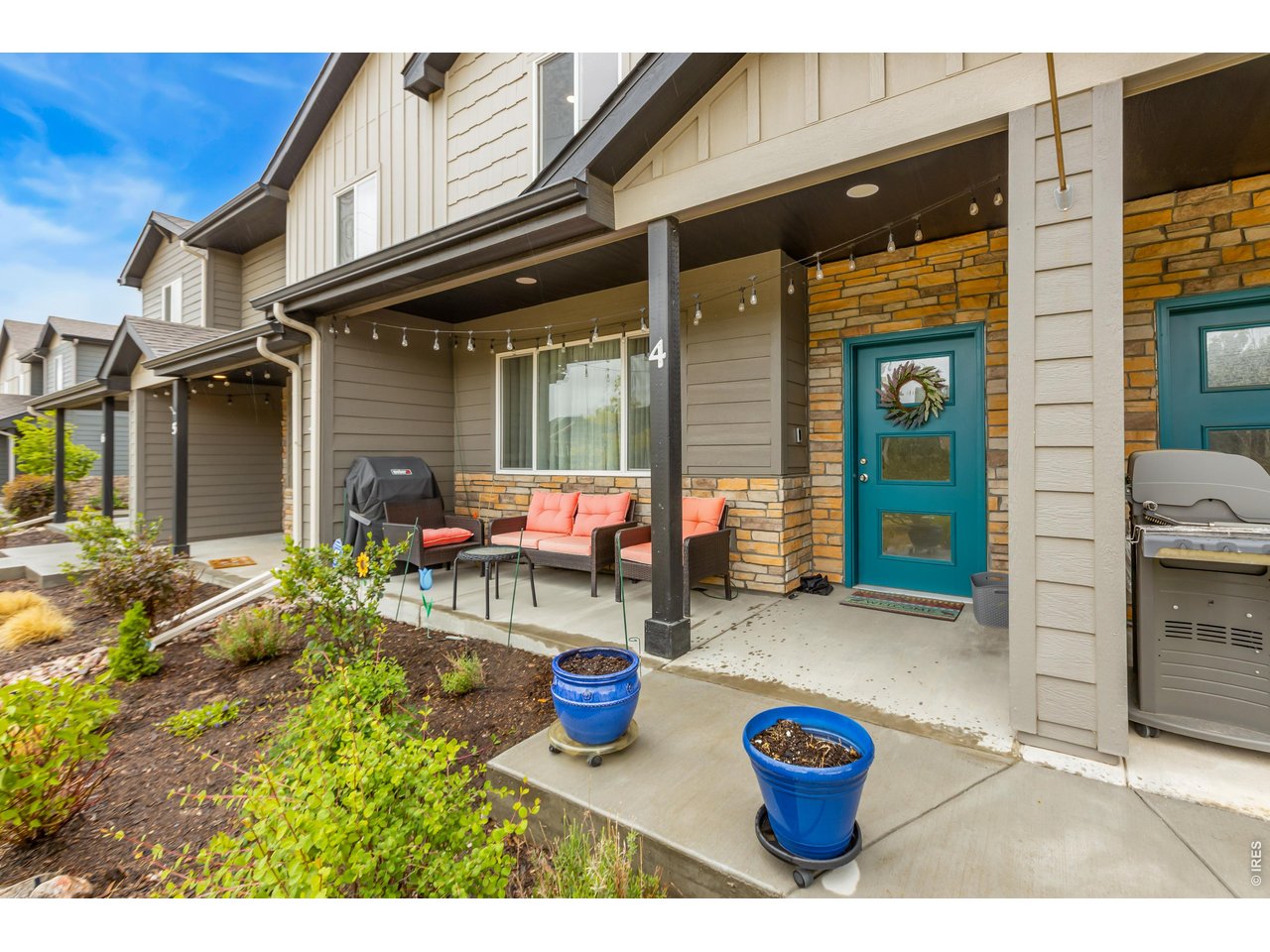 6609 4th St Road, Unit 4 Greeley, CO 80634 - Photo 4 of 41 a view of a chairs and table in the patio