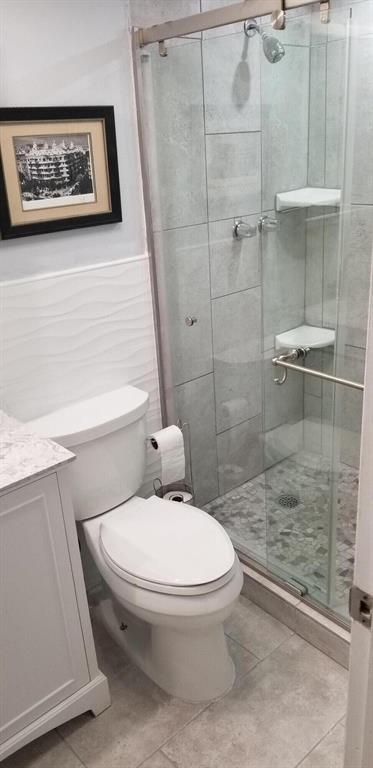 320 South Surf Road, Unit 704 Hollywood, FL 33019 - Photo 13 of 20 a white toilet sitting next to a bath tub