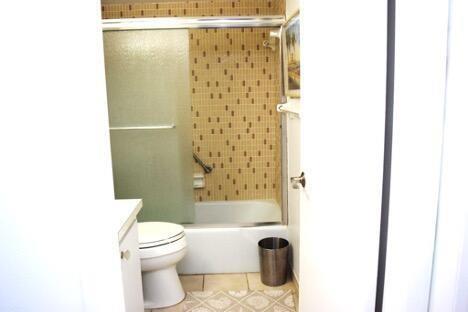 320 South Surf Road, Unit 704 Hollywood, FL 33019 - Photo 16 of 20 a bathroom with a toilet and a shower