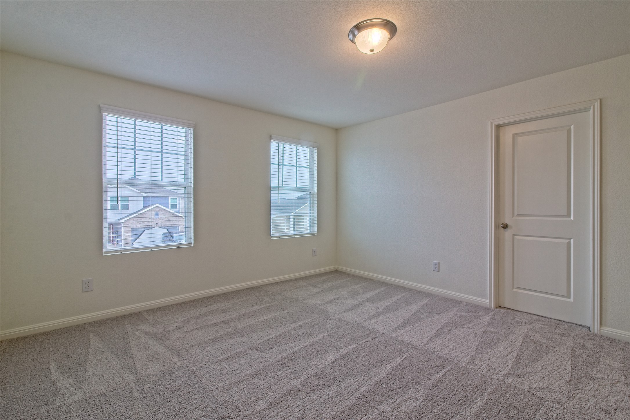 109 Gemsbok Road Hutto, TX 78634 - Photo 16 of 30 an empty room with windows