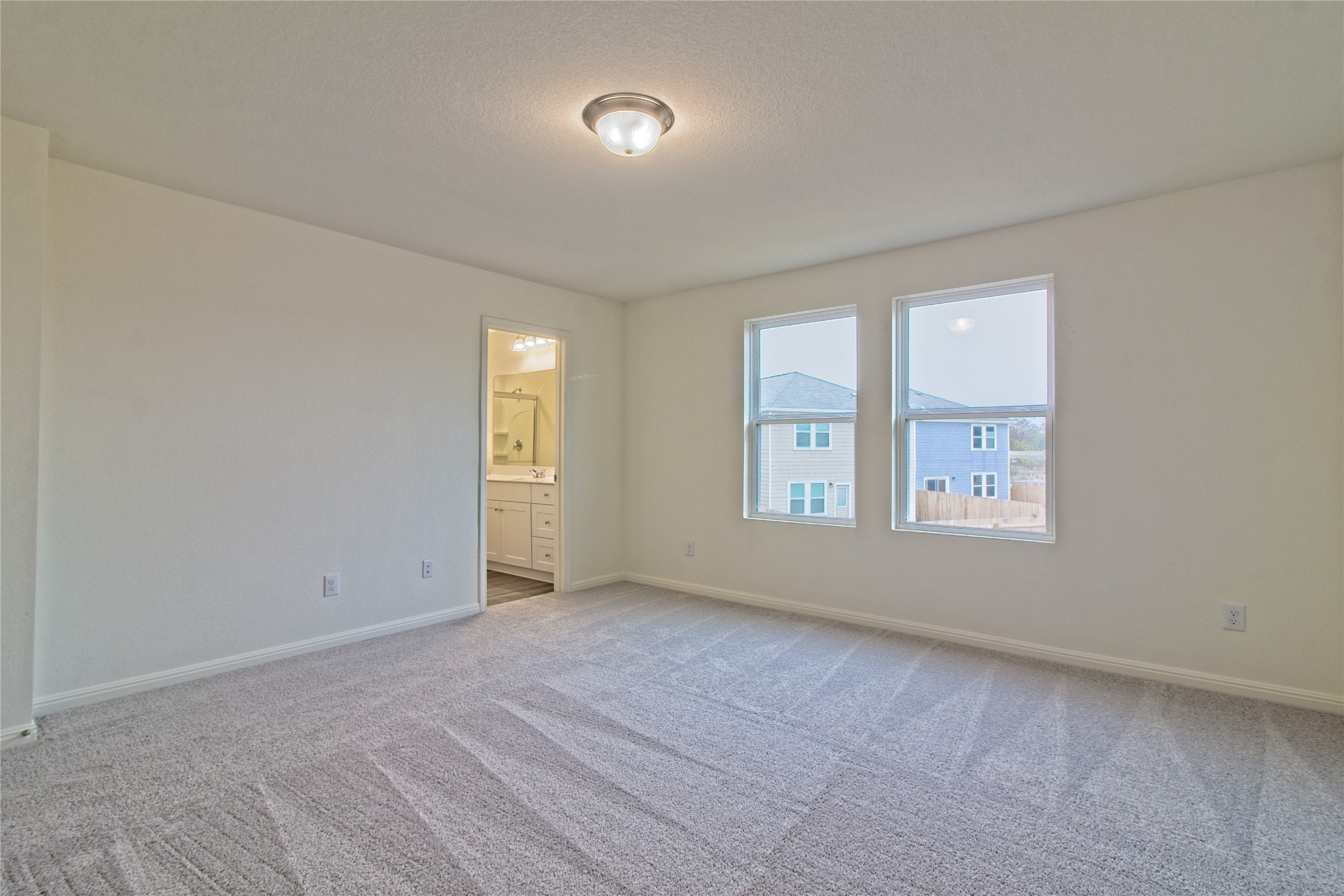 109 Gemsbok Road Hutto, TX 78634 - Photo 18 of 30 an empty room with windows
