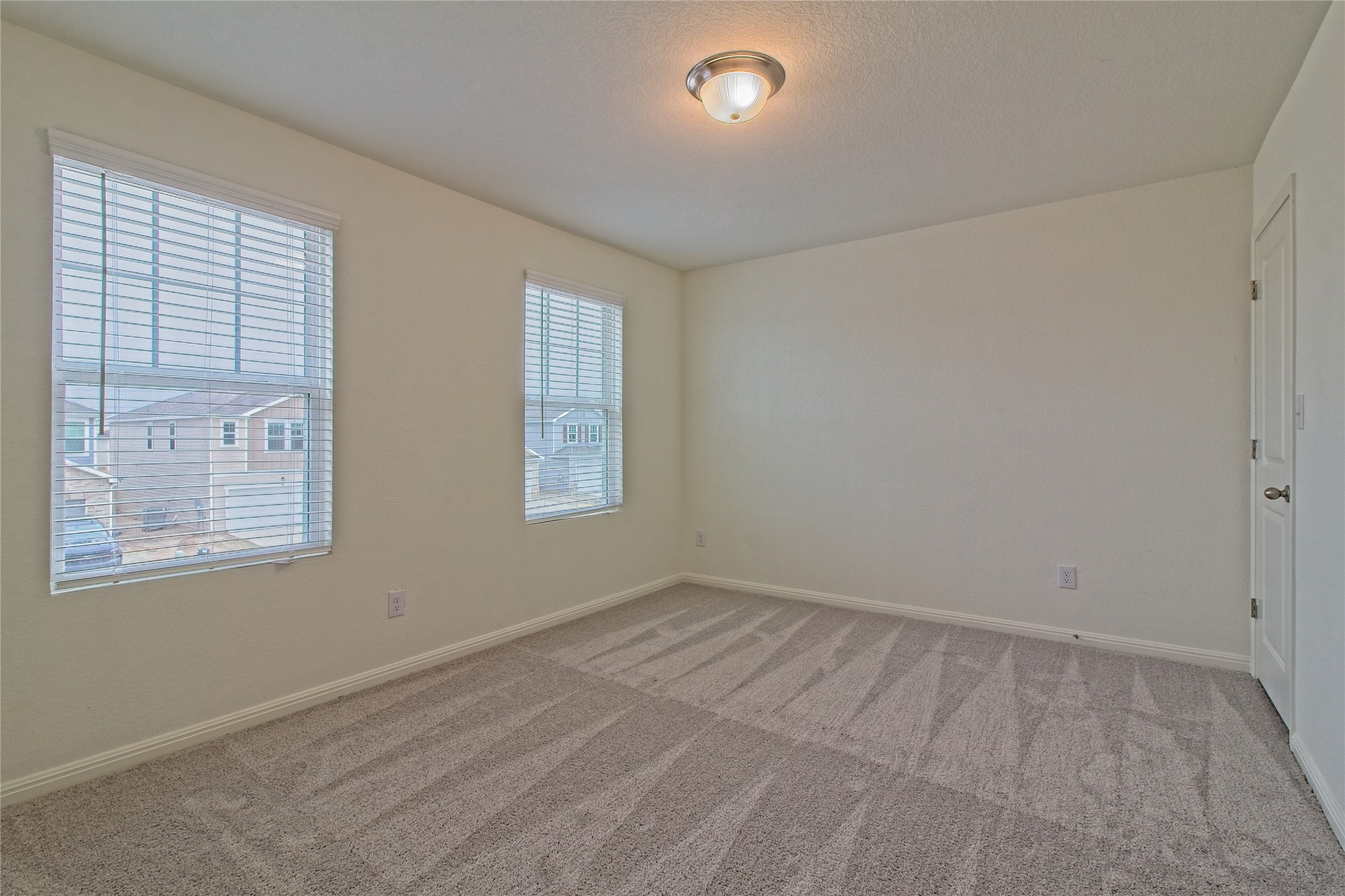109 Gemsbok Road Hutto, TX 78634 - Photo 21 of 30 an empty room with windows