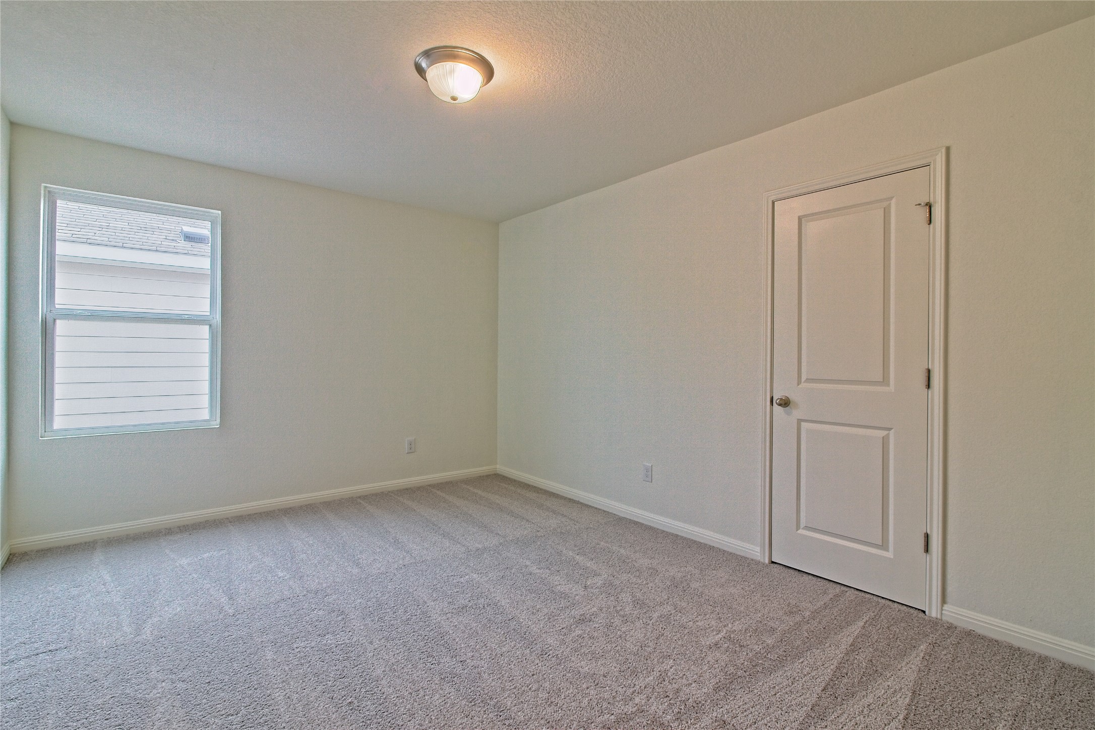 109 Gemsbok Road Hutto, TX 78634 - Photo 22 of 30 an empty room with windows