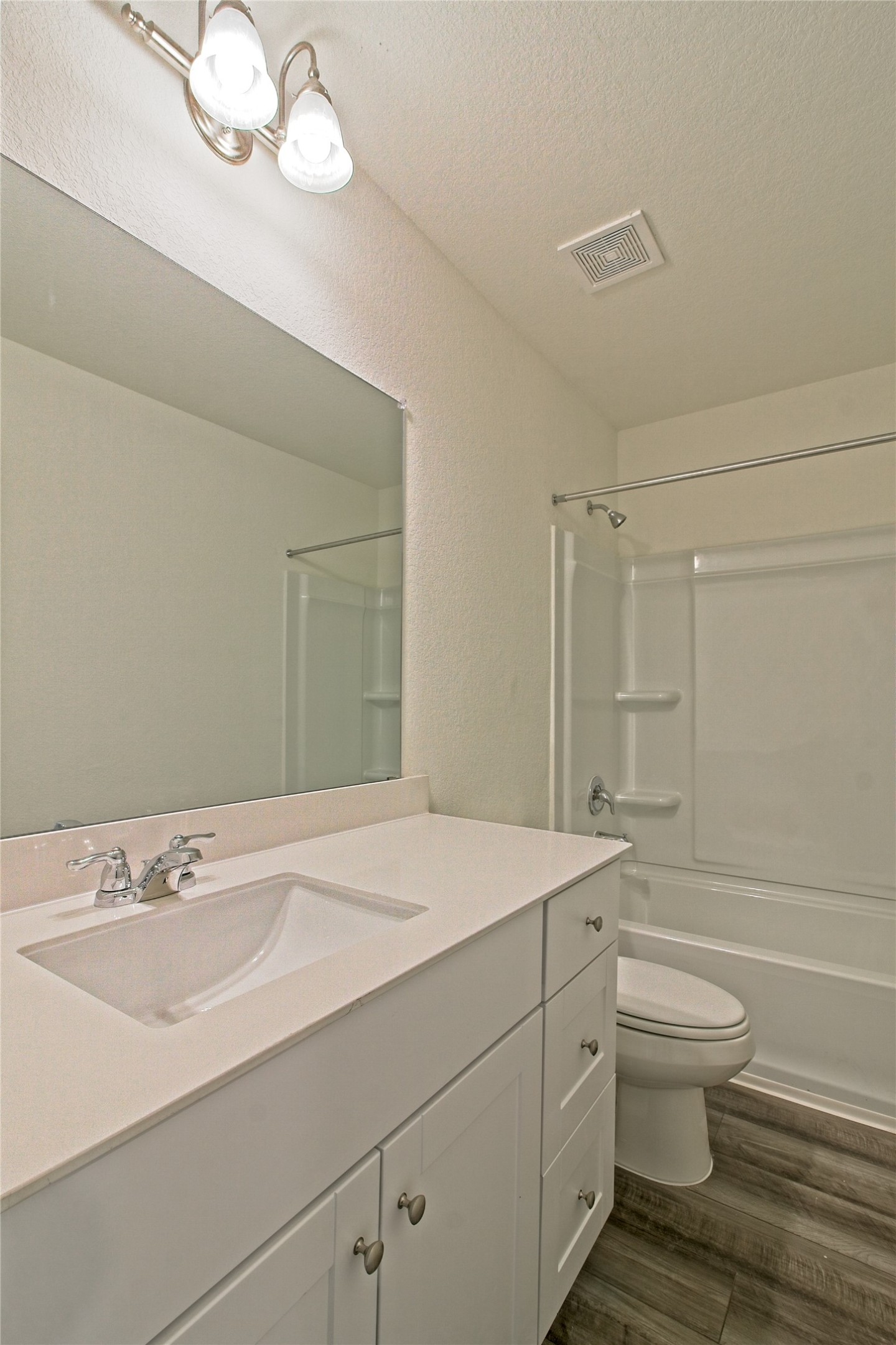 109 Gemsbok Road Hutto, TX 78634 - Photo 23 of 30 a bathroom with a sink a toilet and shower