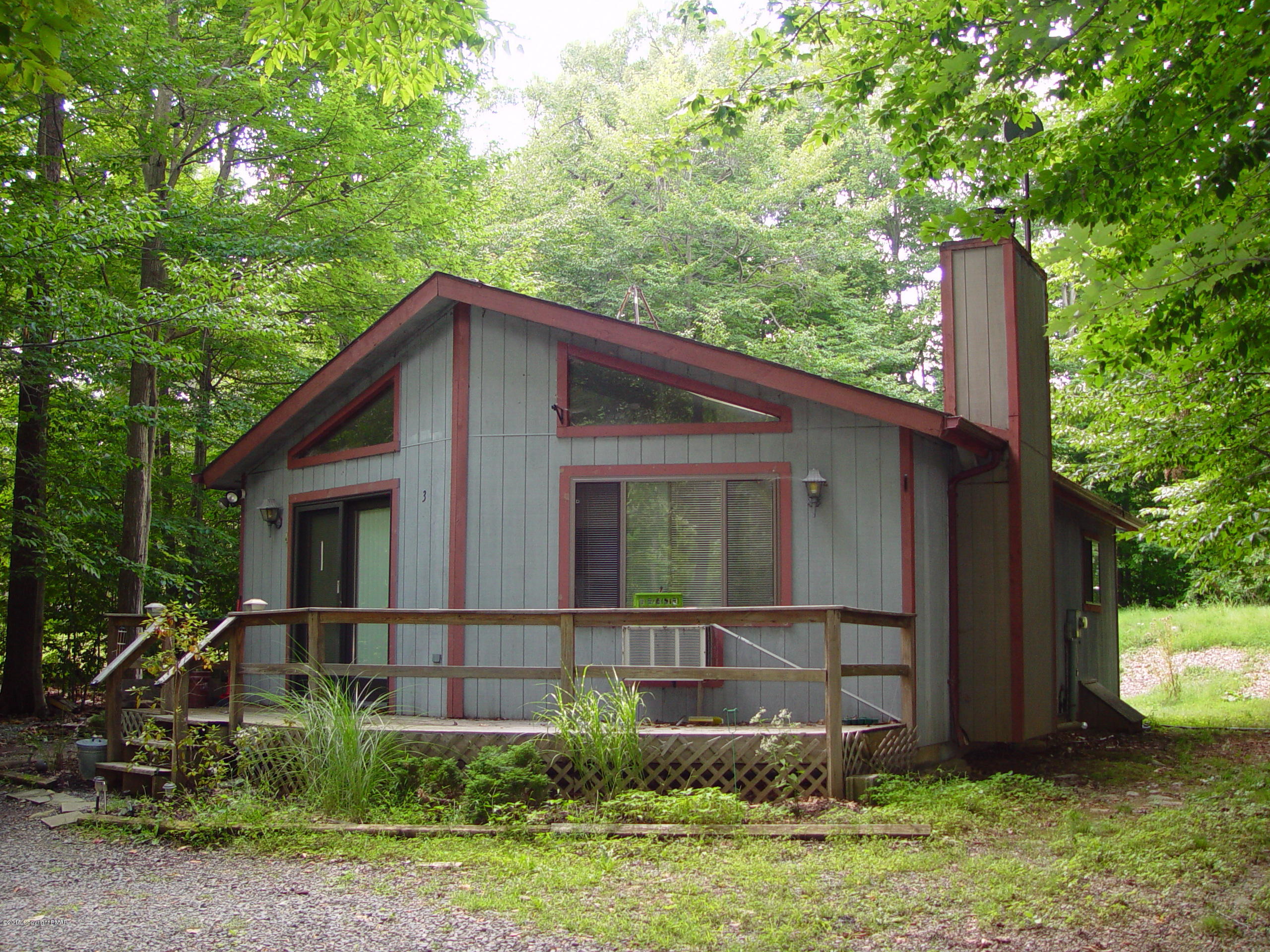 29 Old Post Road Tobyhanna, PA 18466 - Photo 3 of 16 a view of a backyard with potted plants and large tree
