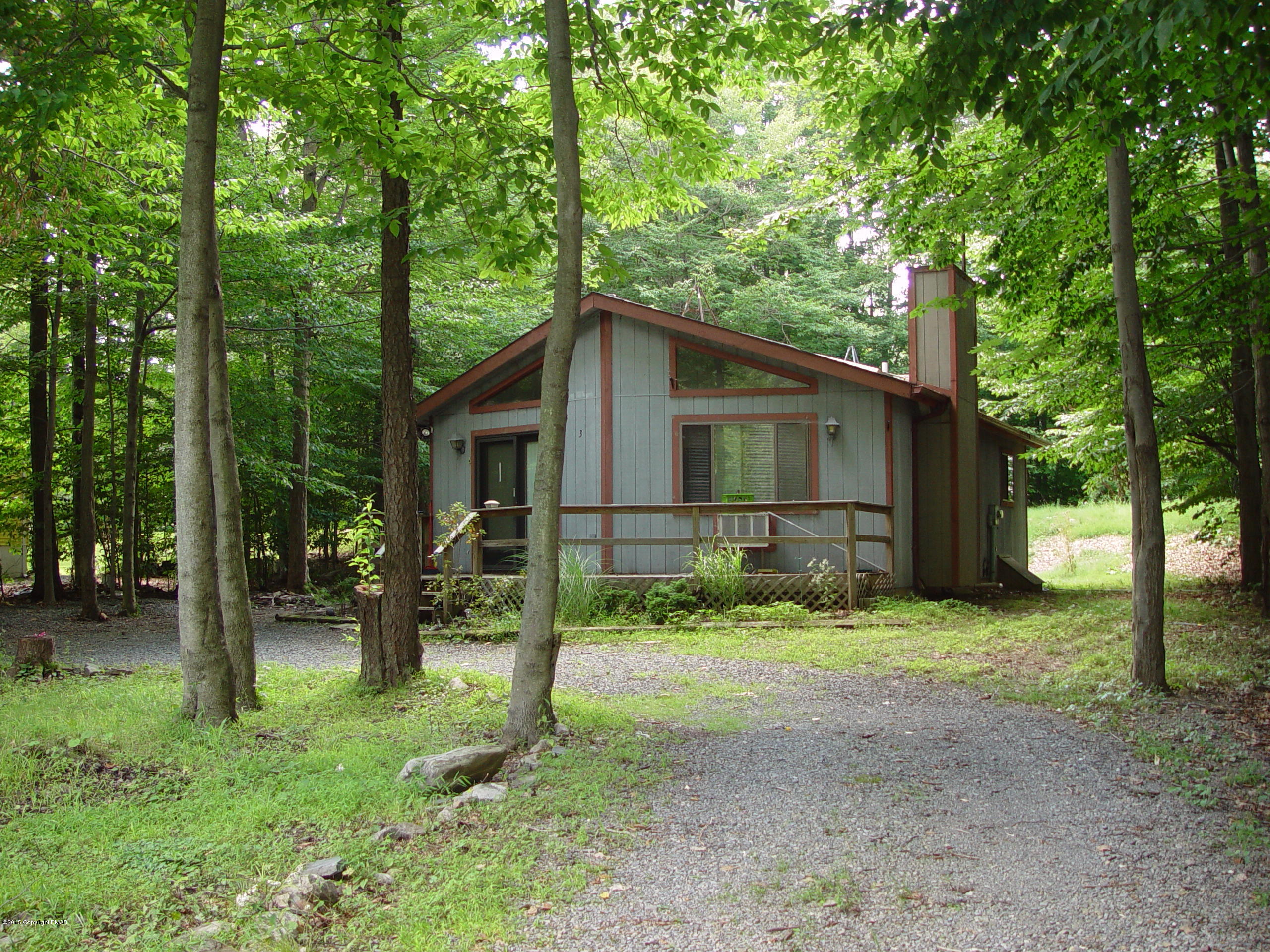 29 Old Post Road Tobyhanna, PA 18466 - Photo 4 of 16 a yellow house in middle of the forest