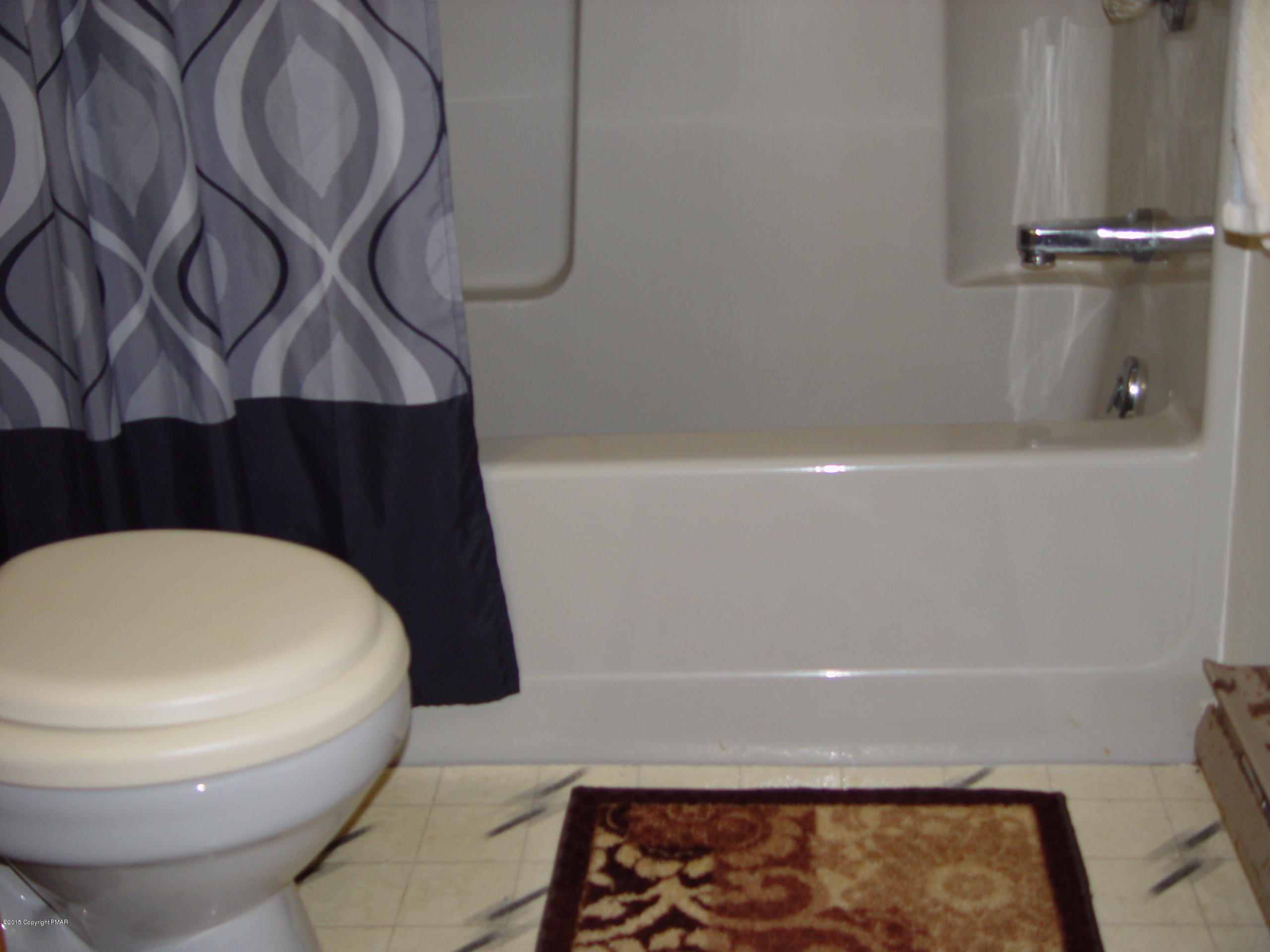 29 Old Post Road Tobyhanna, PA 18466 - Photo 7 of 16 a bathroom with a toilet and a shower