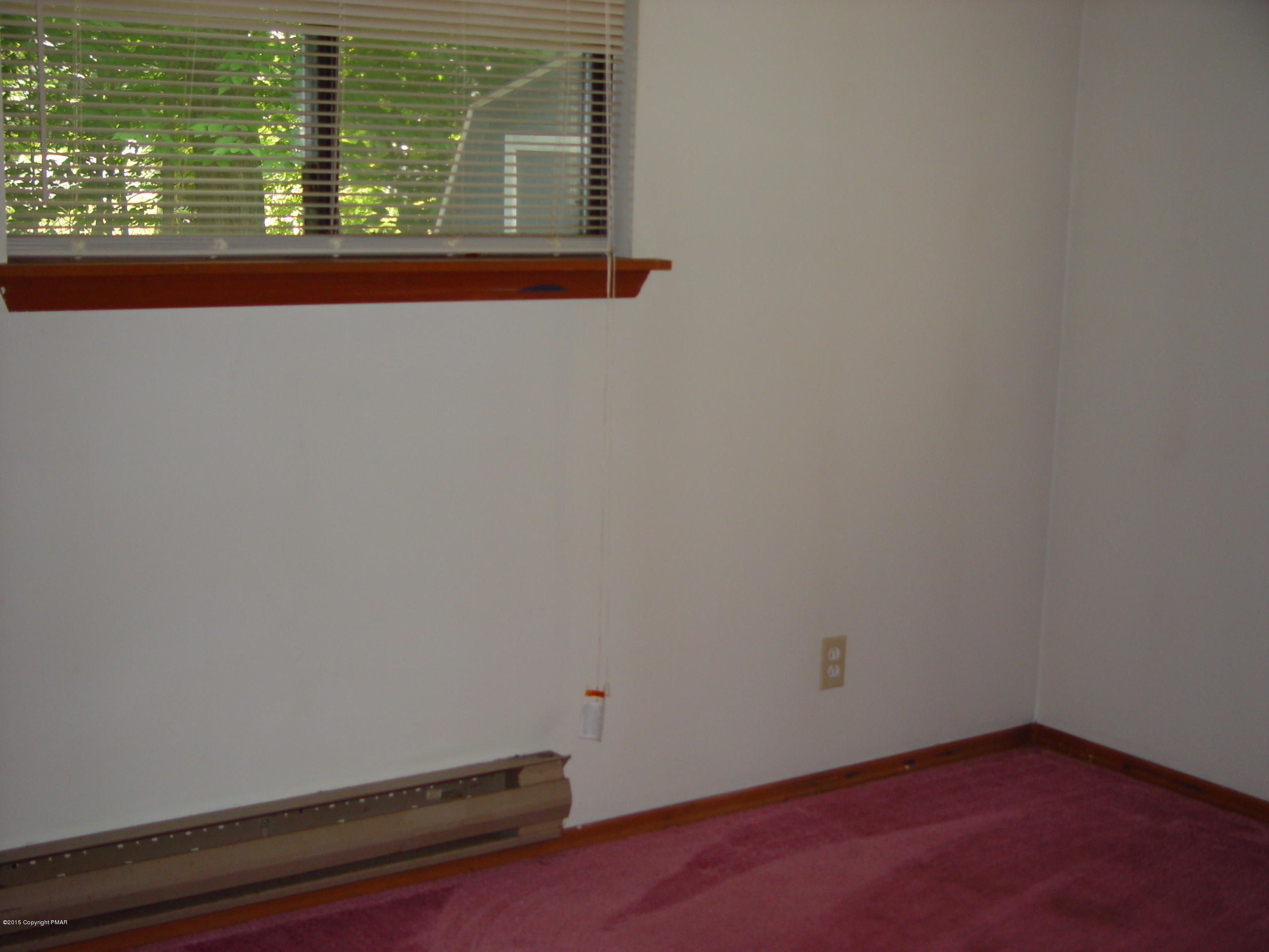 29 Old Post Road Tobyhanna, PA 18466 - Photo 8 of 16 a view of an empty room with a window