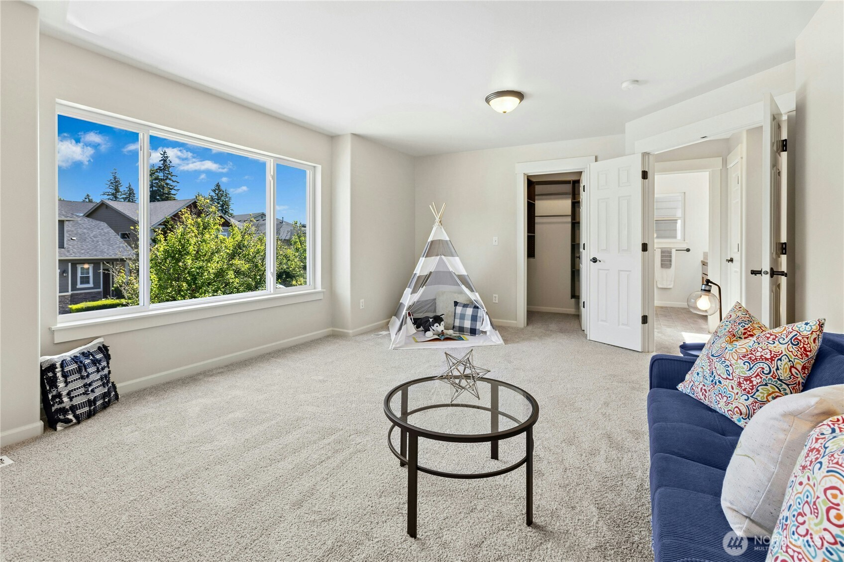 22624 43rd Drive Southeast Bothell, WA 98021 - Photo 27 of 36 a living room with furniture and a large window