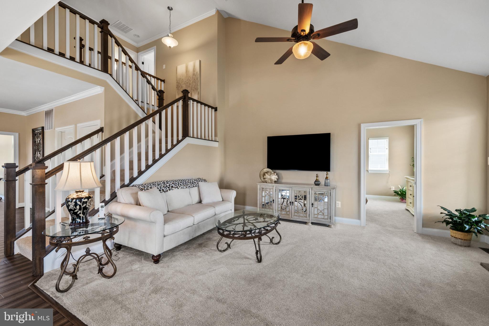 9736 Cross Road Perry Hall, MD 21128 - Photo 13 of 32 a living room with furniture and a flat screen tv