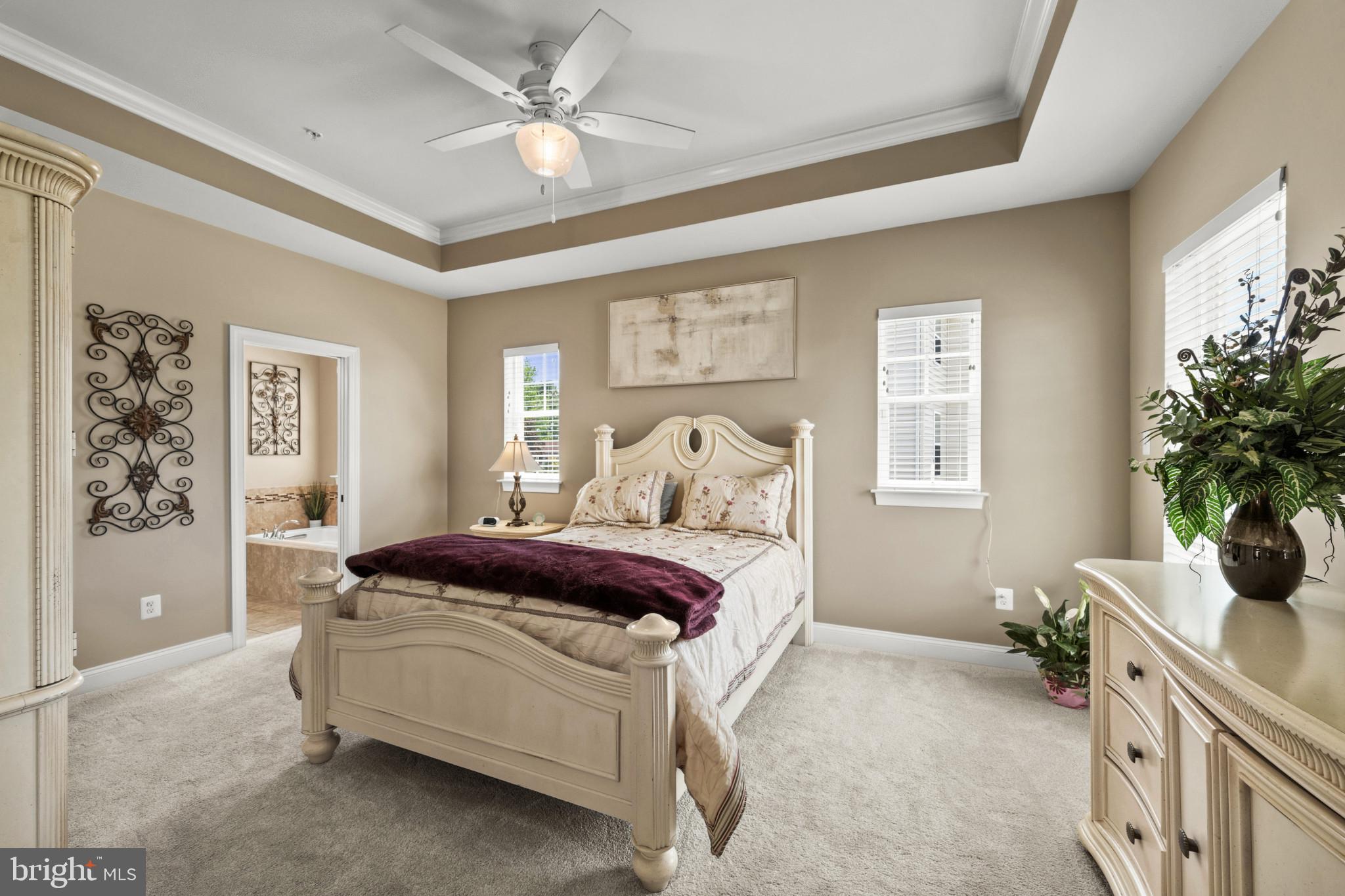 9736 Cross Road Perry Hall, MD 21128 - Photo 16 of 32 a spacious bedroom with a bed and a window