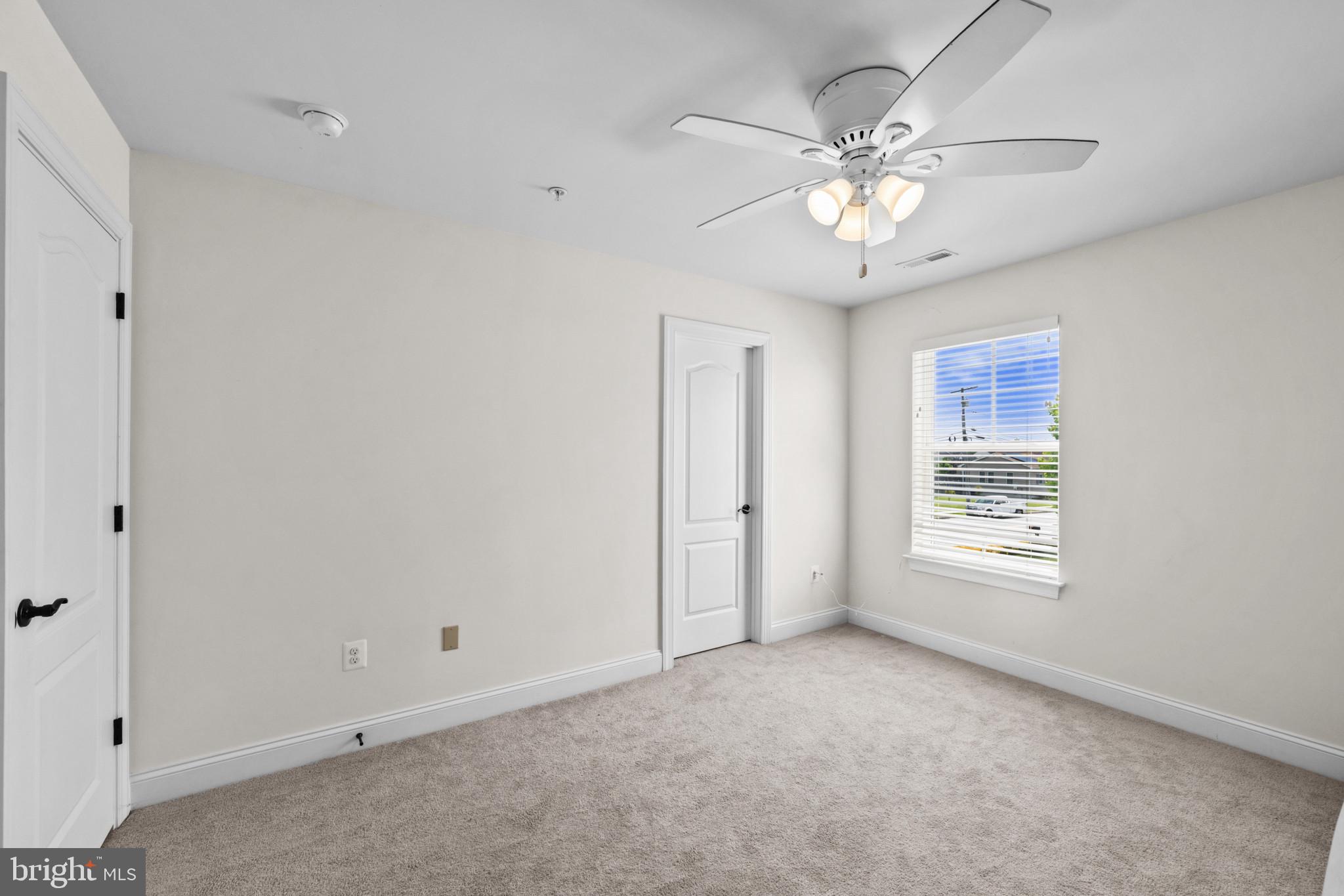 9736 Cross Road Perry Hall, MD 21128 - Photo 23 of 32 a view of an empty room with a window