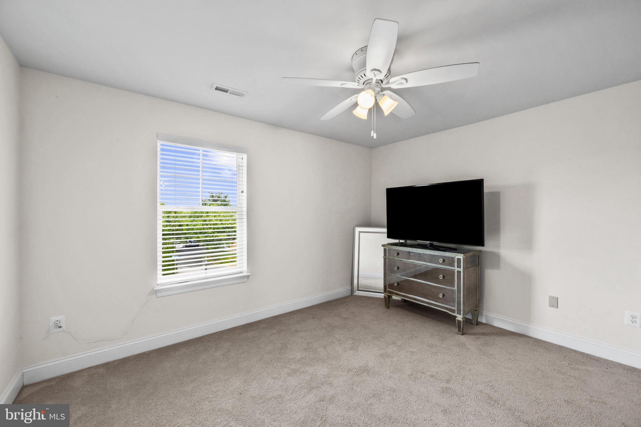 9736 Cross Road Perry Hall, MD 21128 - Photo 24 of 32 a view of a livingroom with furniture and a window