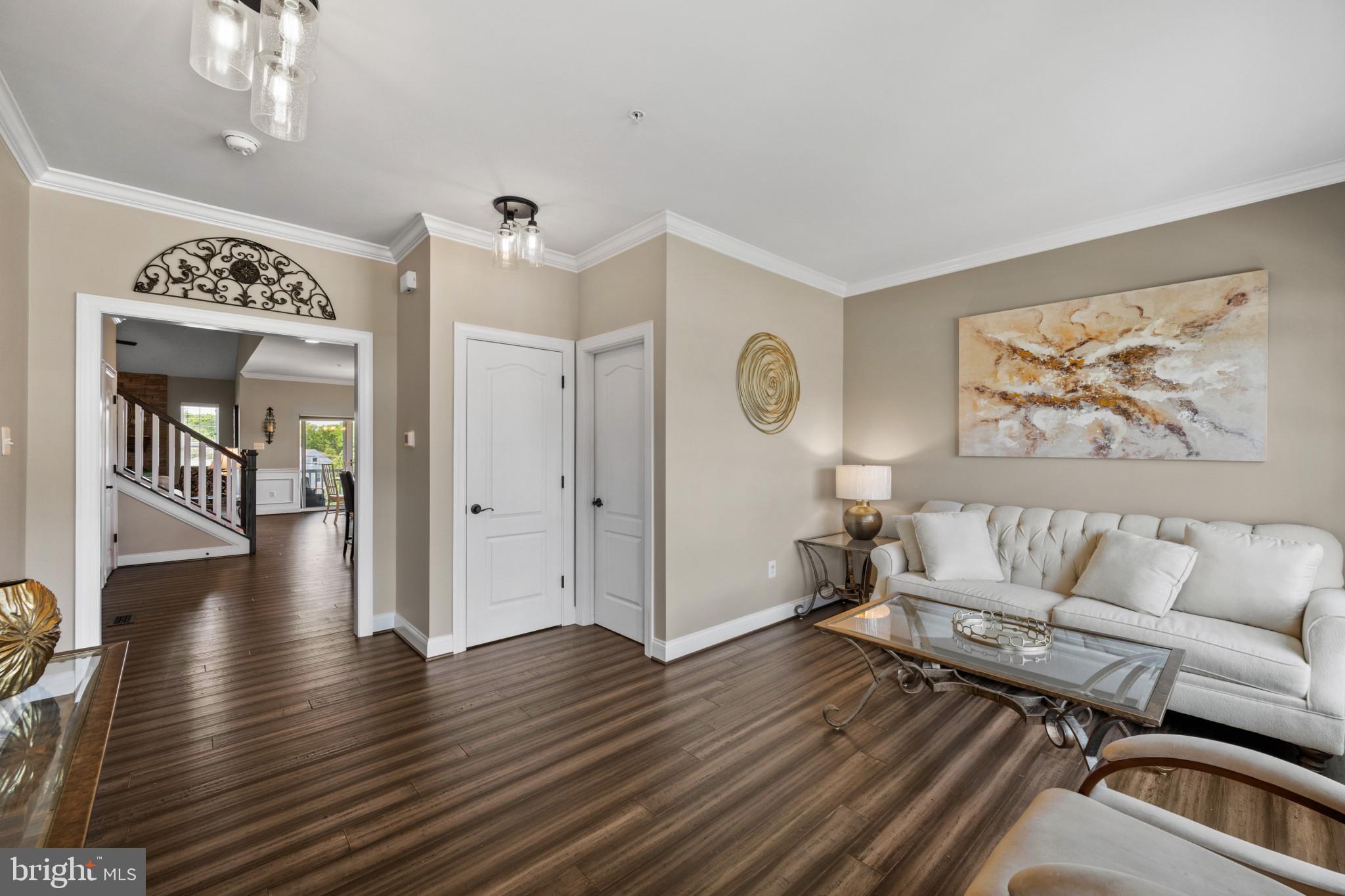 9736 Cross Road Perry Hall, MD 21128 - Photo 5 of 32 a living room with furniture and a wooden floor