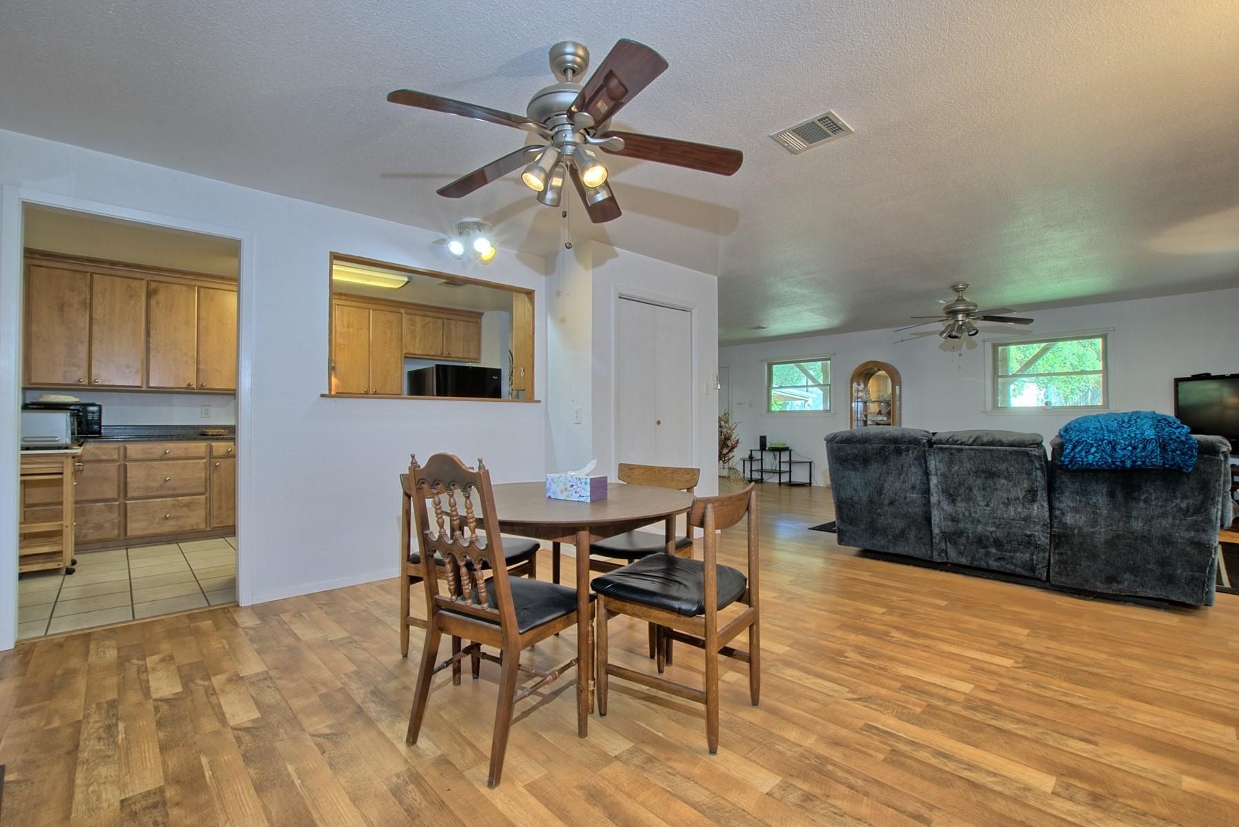360 Oakhill Road Hemphill, TX 75948 - Photo 16 of 31 a view of a dining room with furniture and chandelier