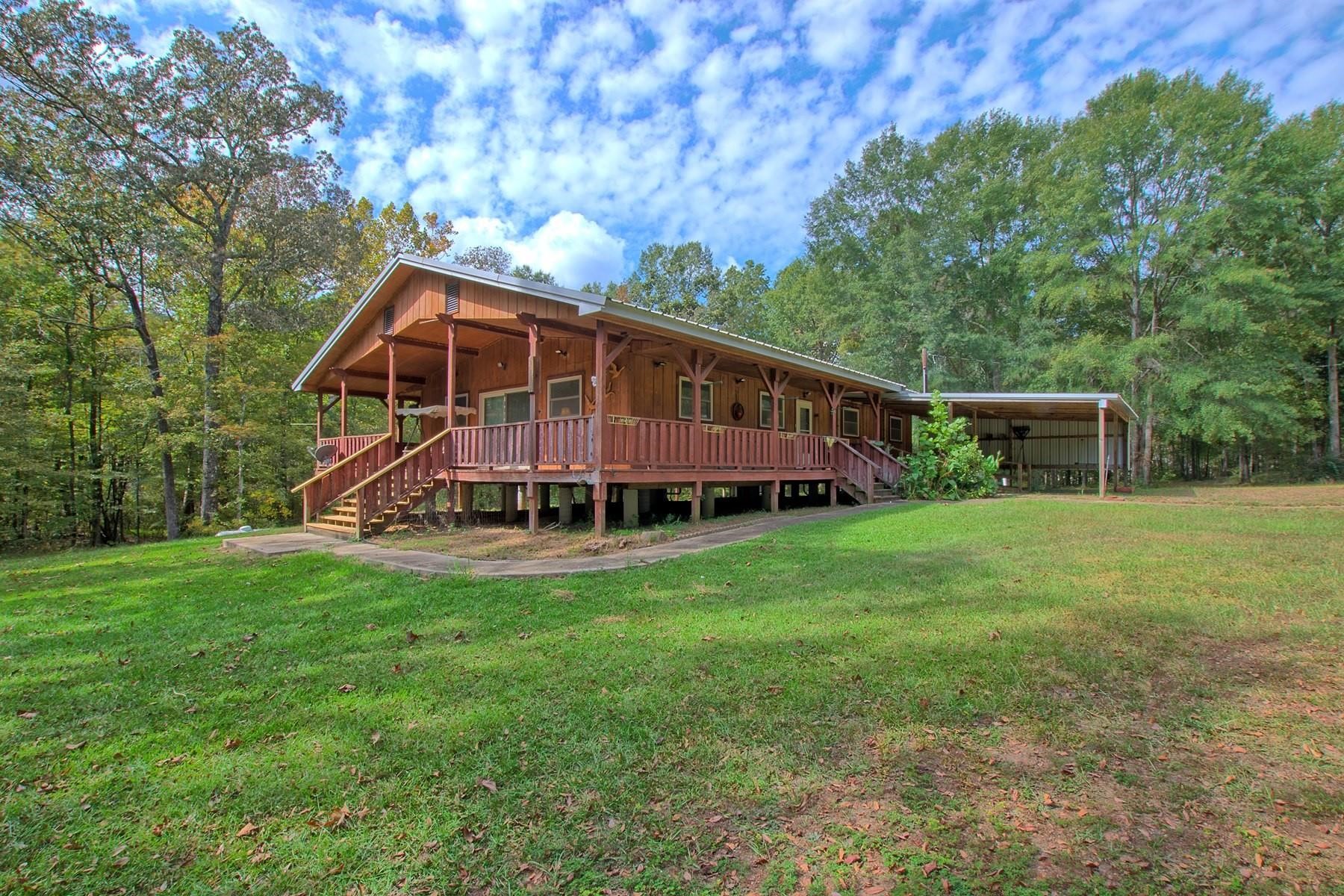 360 Oakhill Road Hemphill, TX 75948 - Photo 4 of 31 a view of a house with backyard and garden