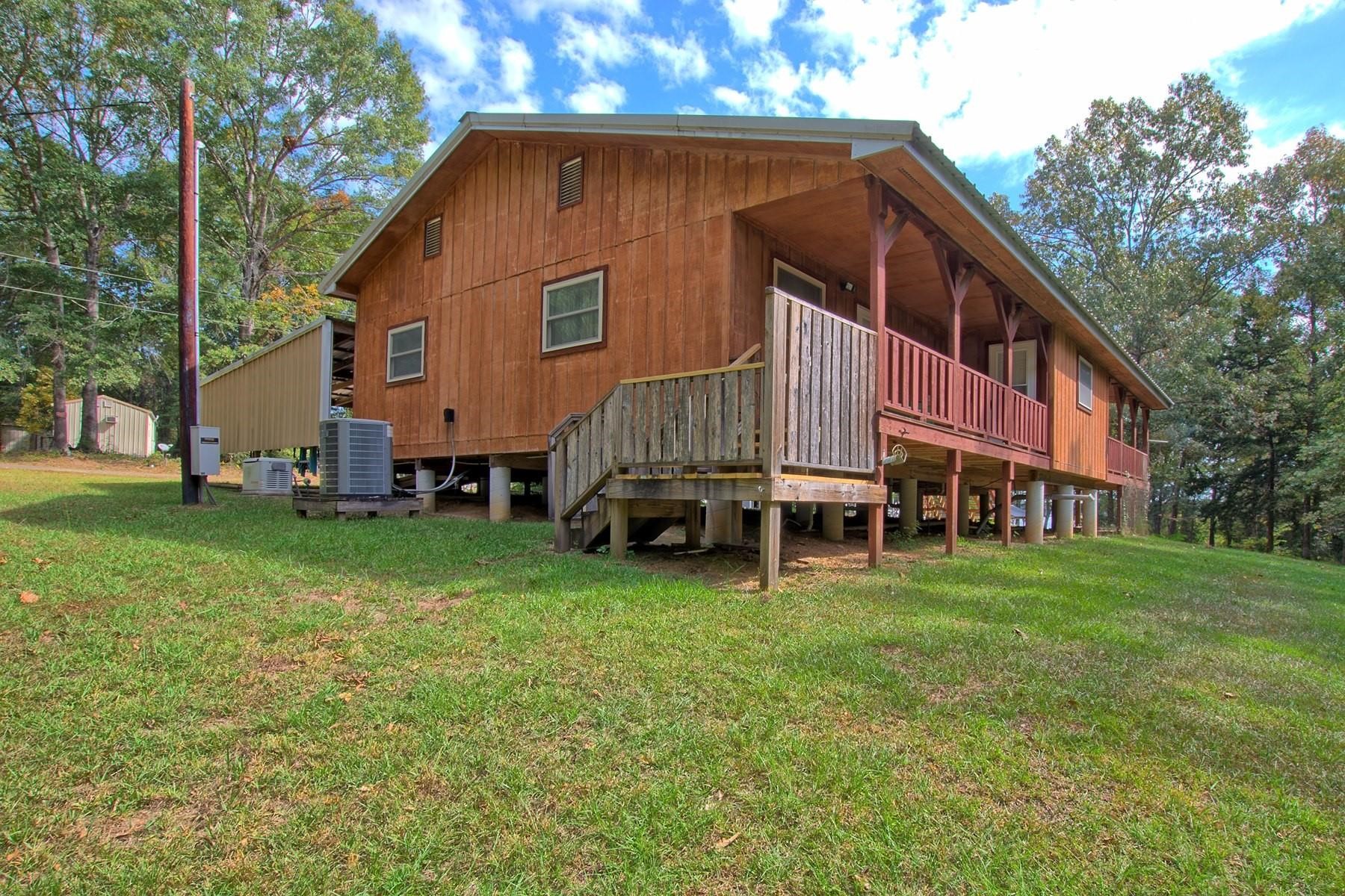 360 Oakhill Road Hemphill, TX 75948 - Photo 5 of 31 a view of a house with a yard