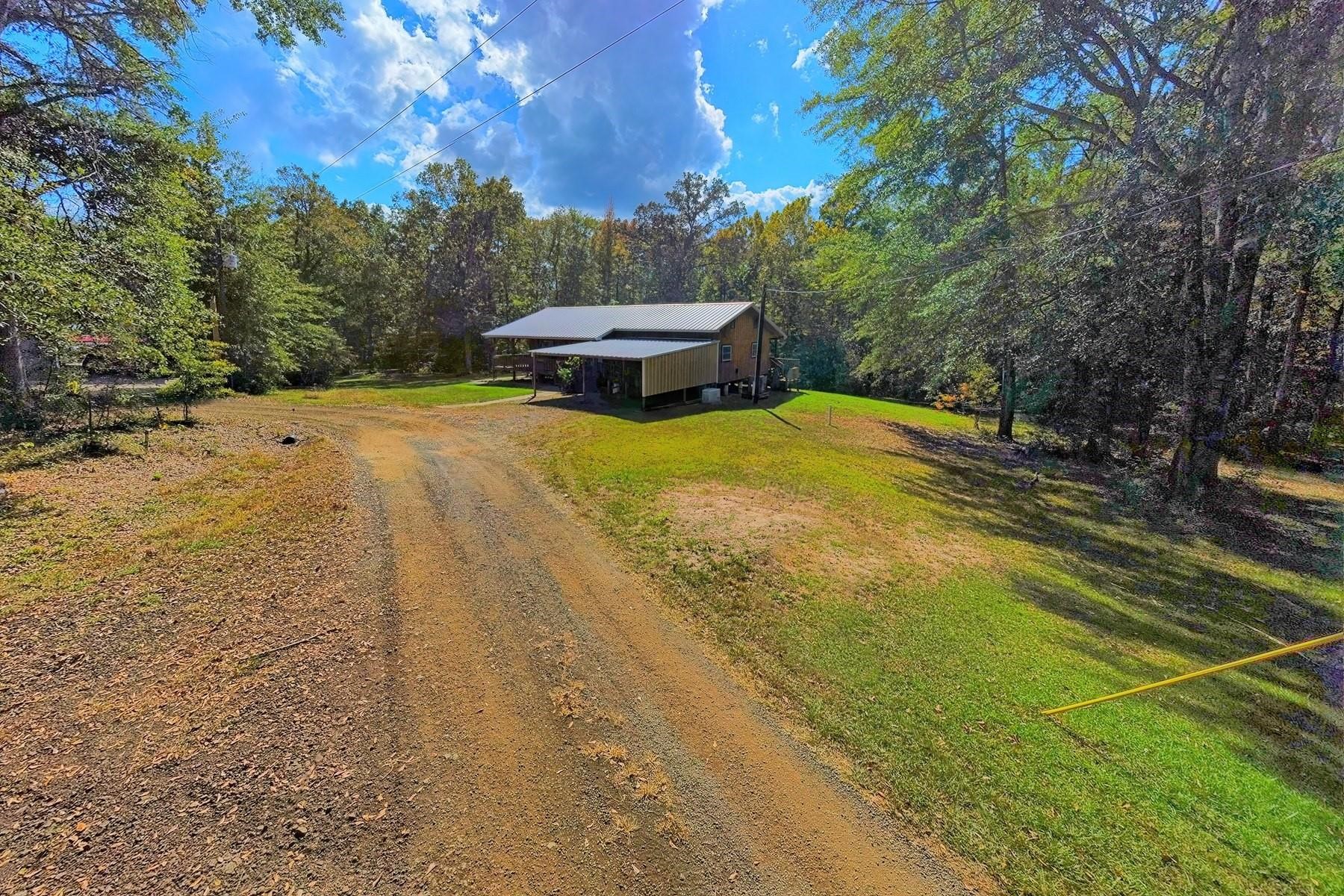 360 Oakhill Road Hemphill, TX 75948 - Photo 7 of 31 a view of a backyard with swimming pool