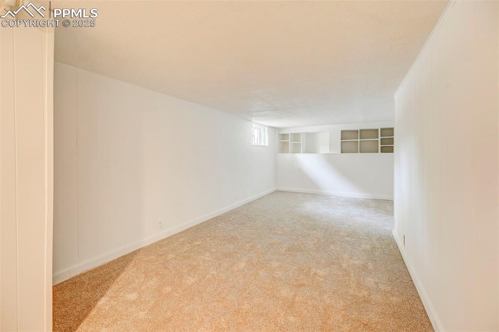 2459 East Willamette Avenue Colorado Springs, CO 80909 - Photo 15 of 19 a view of hallway with white walls