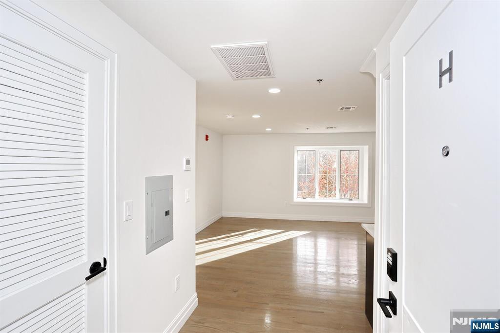 160 Terrace Street, Unit 2H Haworth, NJ 07641 - Photo 11 of 22 a view of an empty room and window