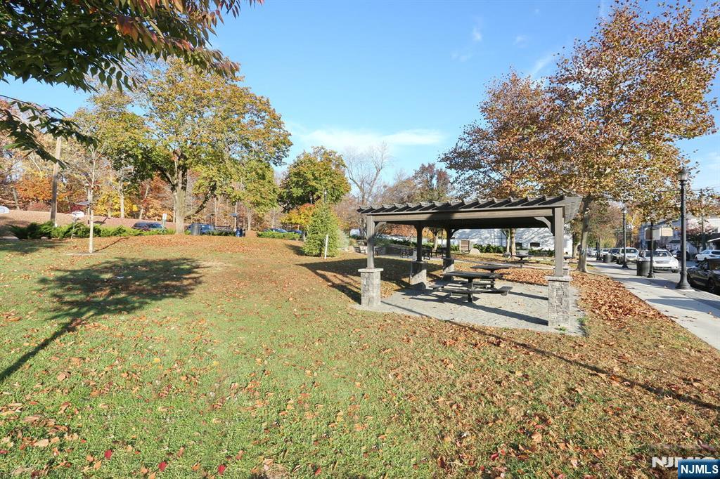 160 Terrace Street, Unit 2H Haworth, NJ 07641 - Photo 18 of 22 a view of a yard with wooden fence