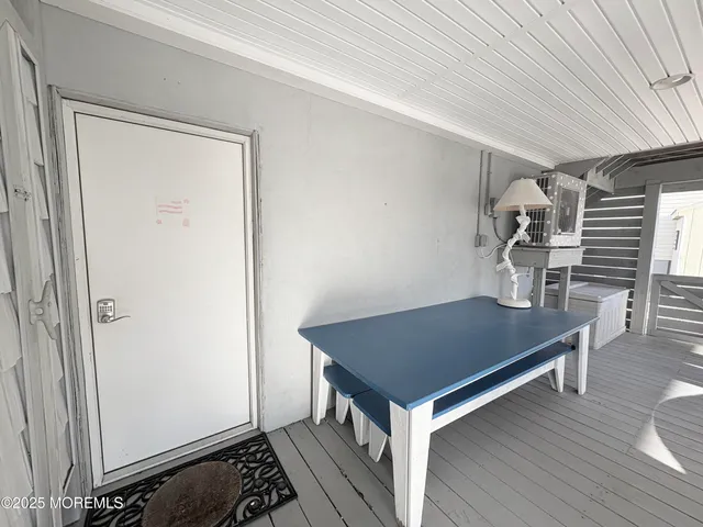 a room with furniture and wooden floor