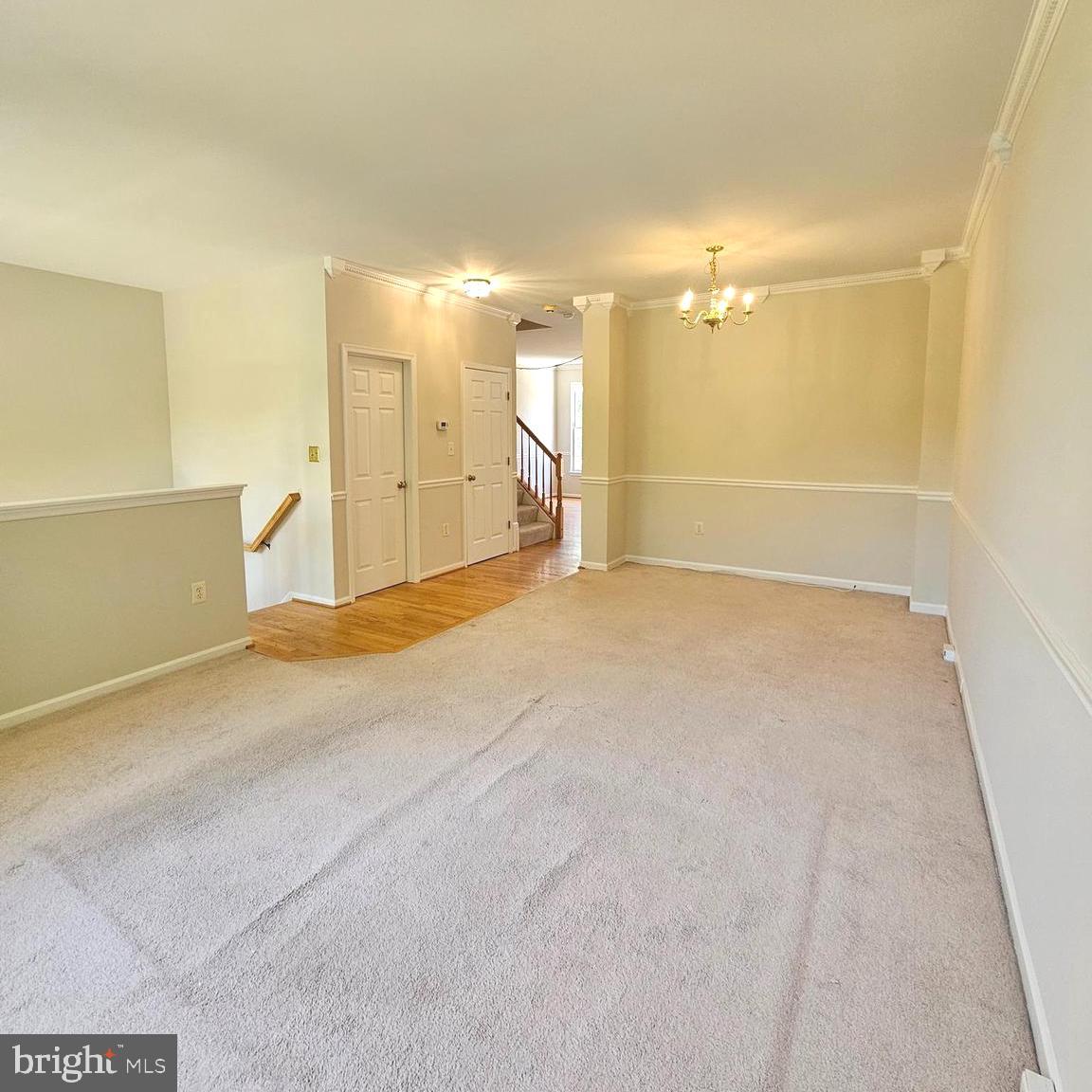 21674 Frame Square Broadlands, VA 20148 - Photo 14 of 43 a view of a room with a stylish ceiling fan and entryway