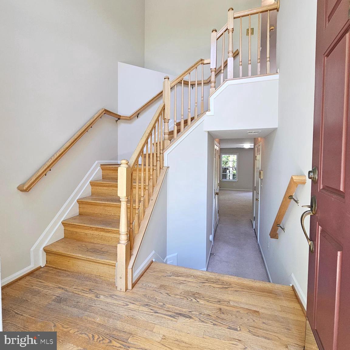 21674 Frame Square Broadlands, VA 20148 - Photo 2 of 43 a view of entryway and hall with wooden floor