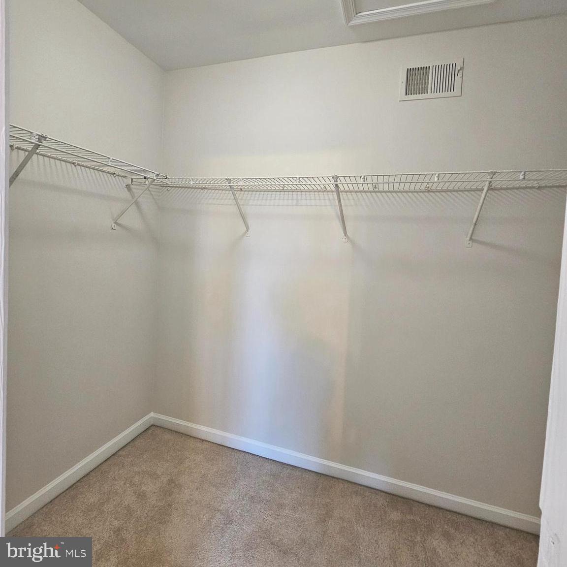 21674 Frame Square Broadlands, VA 20148 - Photo 27 of 43 a view of a room with racks on the wall