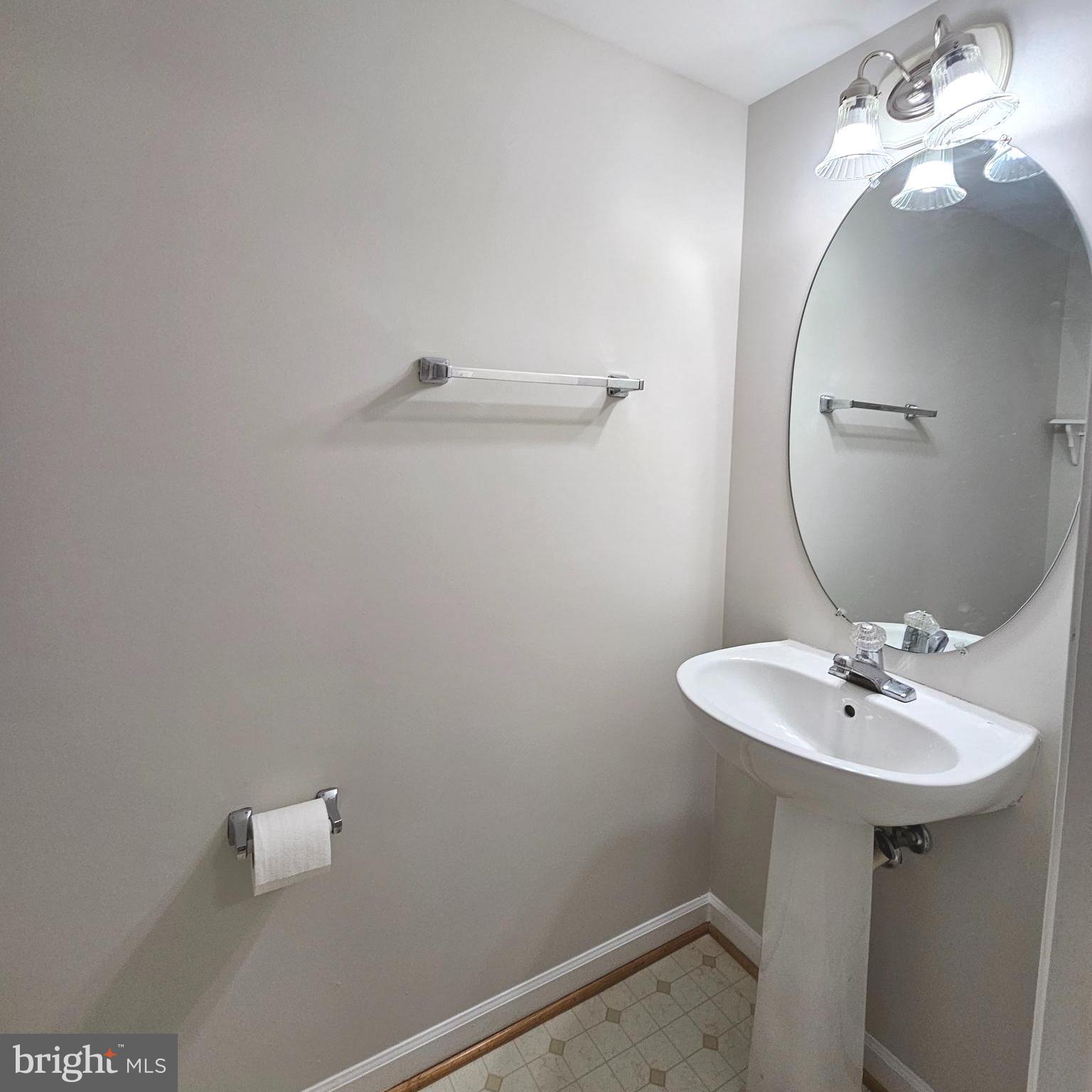 21674 Frame Square Broadlands, VA 20148 - Photo 39 of 43 a bathroom with a sink a mirror and vanity