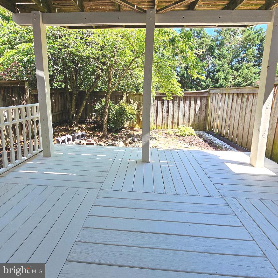 21674 Frame Square Broadlands, VA 20148 - Photo 42 of 43 a view of backyard with wooden floor and outdoor seating