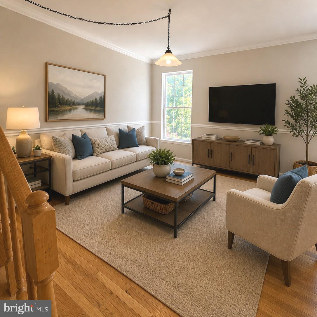 21674 Frame Square Broadlands, VA 20148 - Photo 6 of 43 a living room with furniture and a flat screen tv