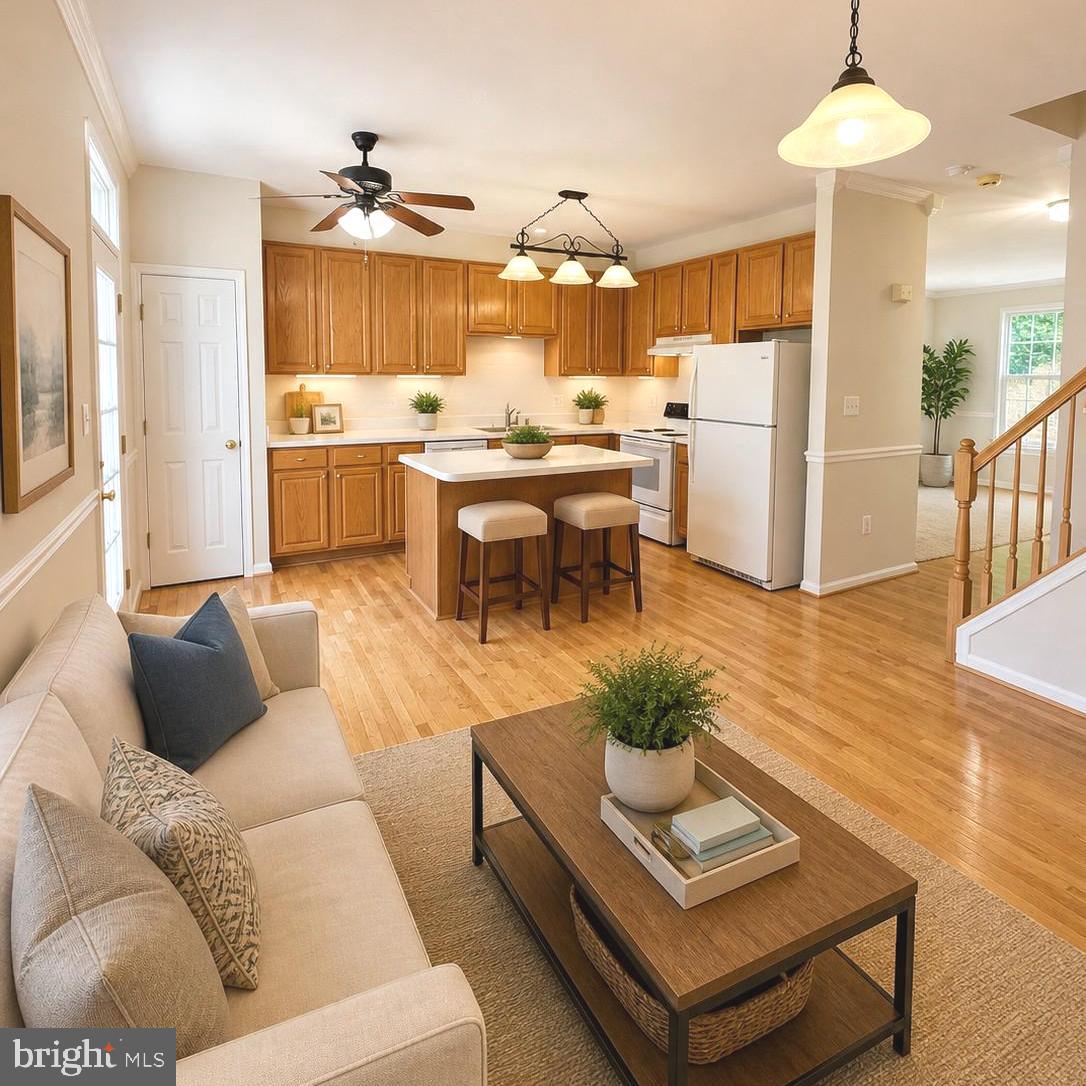 21674 Frame Square Broadlands, VA 20148 - Photo 7 of 43 a living room with furniture and kitchen view